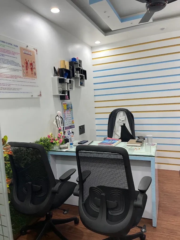 Reception desk with two chairs at the clinic